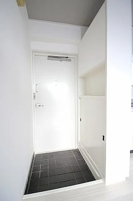 神戸市灘区弓木町５丁目の賃貸マンションの玄関
