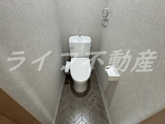 エルドムス陽光三番館のトイレ|落ち着いた色調のトイレです
