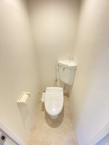 大阪市淀川区木川西２丁目の賃貸マンションのトイレ