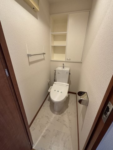 西新テングッドシティSAVOYのトイレ|落ち着いた色調のトイレです