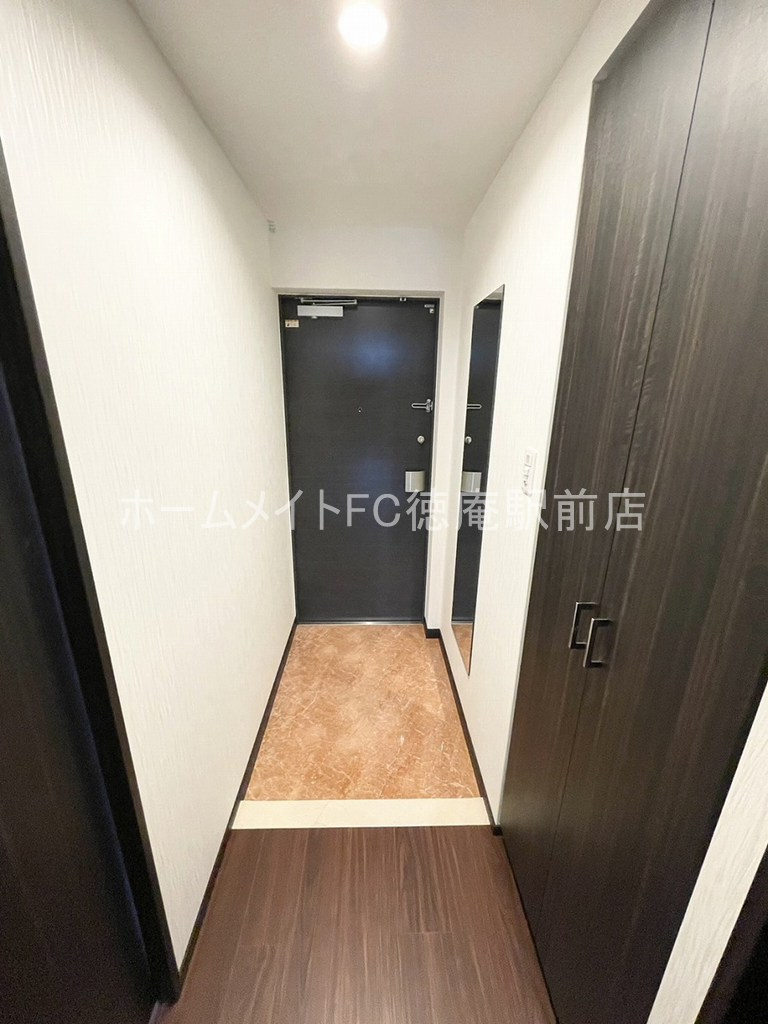 プレジオ森河内ASIANの玄関