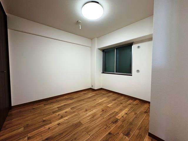 エクセラート高井田の寝室