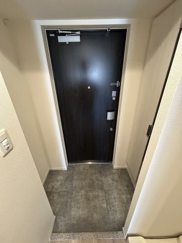 プレサンス塚本アクミリオンの玄関