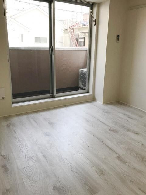 b'CASA Otakebashi Ave.の居間・リビング