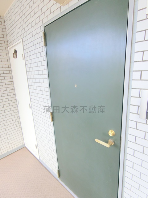 グローリア初穂東糀谷の玄関
