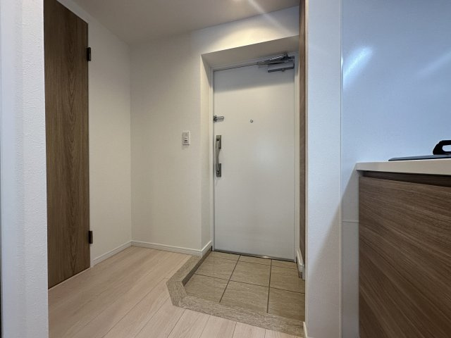 川崎市多摩区宿河原６丁目の賃貸マンションの玄関