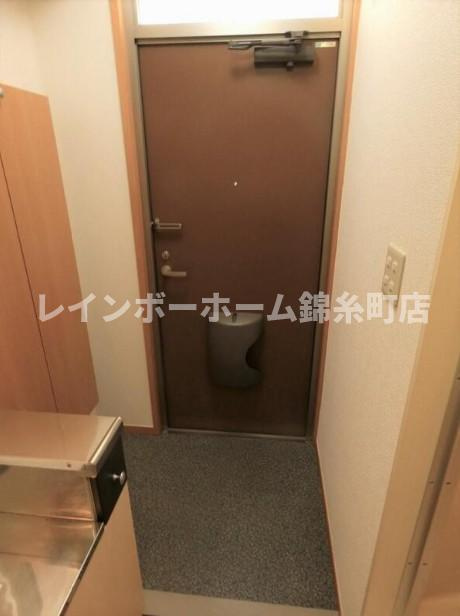 クローバー1番館の玄関