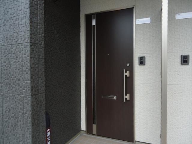 メイプルコートＡの玄関