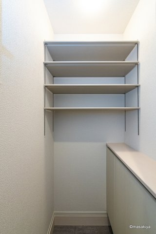 プレジール高田の玄関