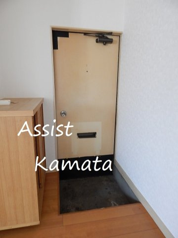 仲六マンションの玄関