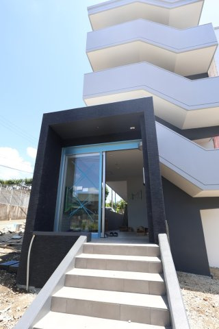 熊本市北区龍田陳内３丁目の賃貸マンションのエントランス