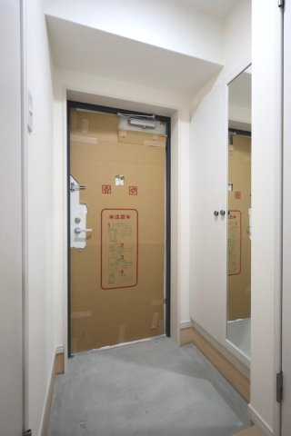 熊本市北区龍田陳内３丁目の賃貸マンションの玄関
