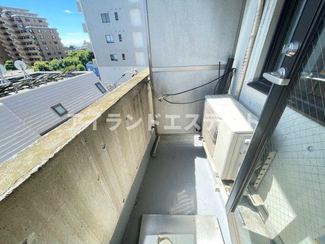 バスクコート　礼金0　駅近　南向き　高層階のバルコニー