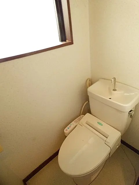 神戸市灘区篠原中町３丁目の賃貸マンションのトイレ