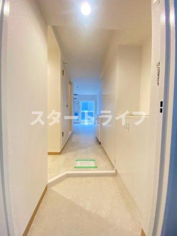 大阪市東淀川区淡路３丁目の賃貸マンションの玄関