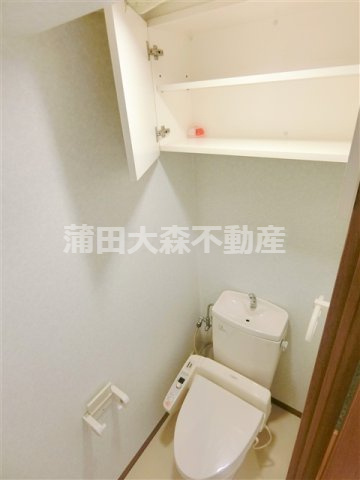 エクセル遠藤のトイレ|吊戸棚収納付きのトイレ