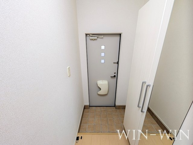 プルメリアコートの玄関