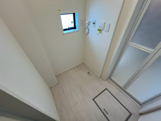 読谷村高志保新築戸建て　1号棟（全2棟）のランドリースペース