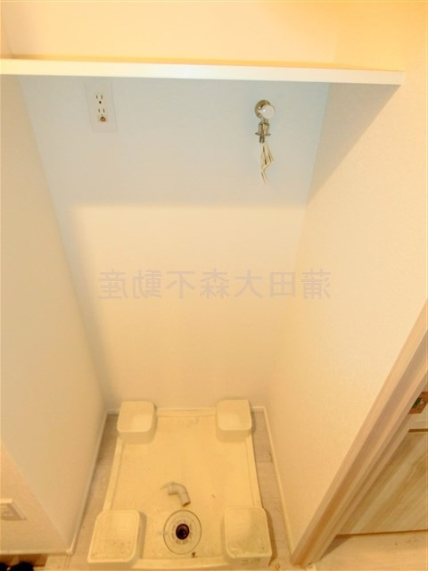 Gatehouse Otoriiの設備|棚付きの室内洗濯機置き場