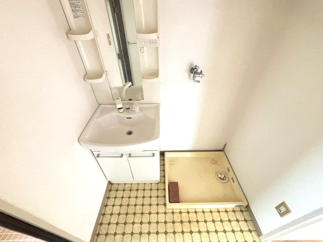 新栄プロパティー軽里の洗面所