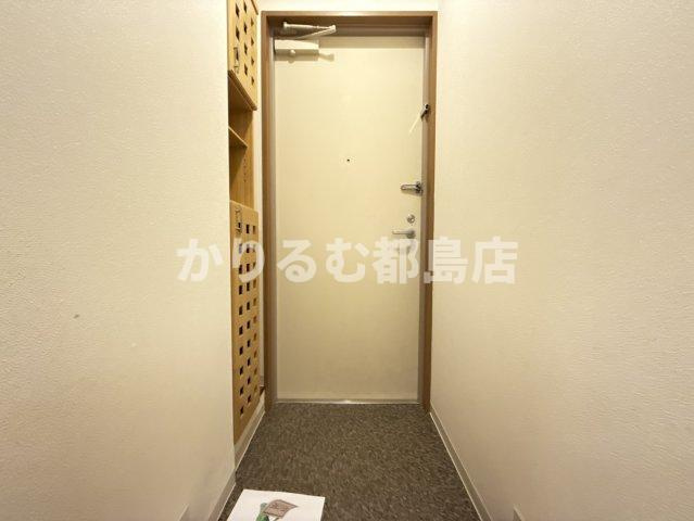 ロイヤルクイーンズパーク関目の玄関