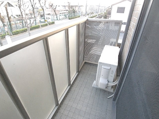 コンフォールヴィル木田元宮のバルコニー