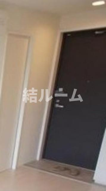 北区西ケ原１丁目の賃貸マンションの玄関