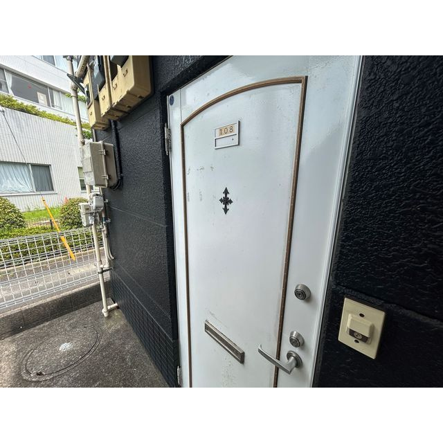 エクシード柿生の玄関