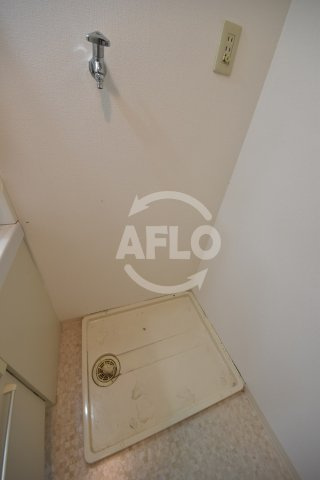 アルテハイム新町　堀江小学校区の洗面所|アルテハイム新町　洗濯機置き場