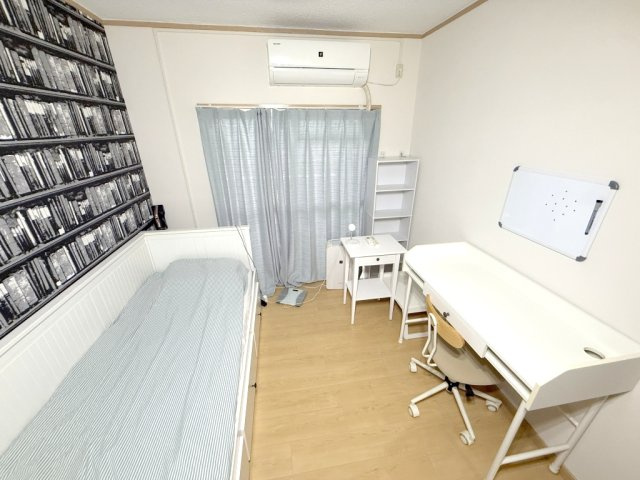 奈良市中登美ヶ丘１丁目の賃貸マンションの洋室