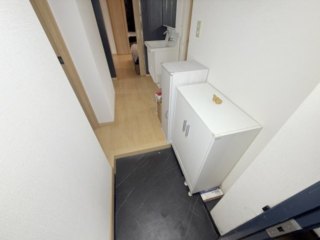 奈良市中登美ヶ丘１丁目の賃貸マンションの玄関