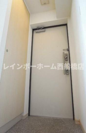 メルヴェイユKYの玄関