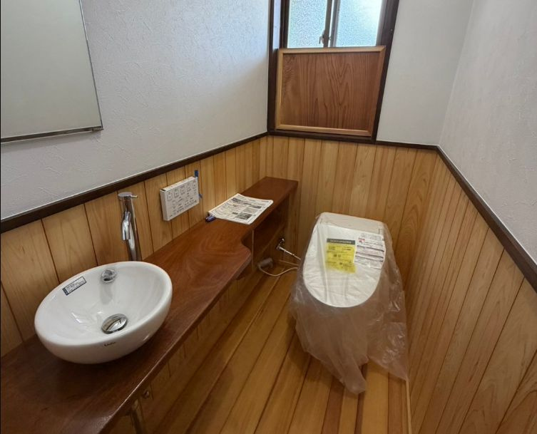 都城市梅北町の中古一戸建のトイレ