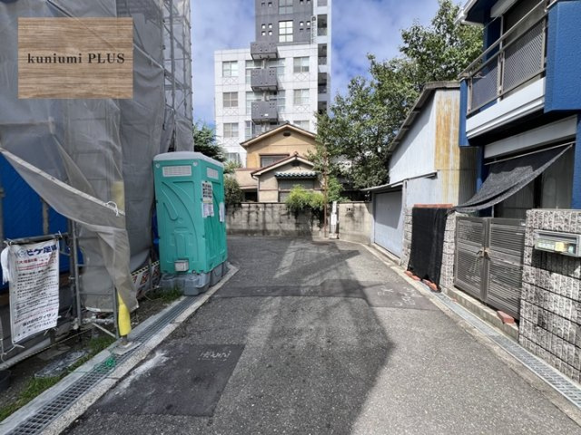 大阪市都島区東野田町4丁目　1号棟の前面道路含む現地写真