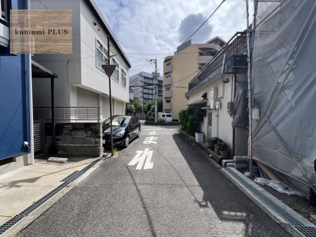 大阪市都島区東野田町4丁目　1号棟の前面道路含む現地写真