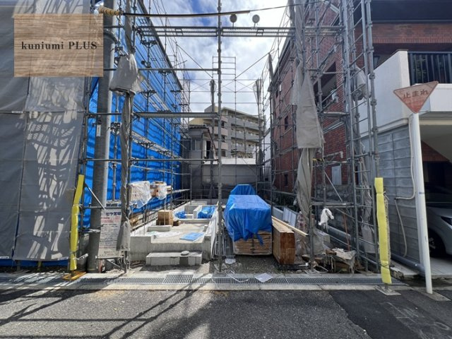 大阪市都島区東野田町4丁目　2号棟の前面道路含む現地写真