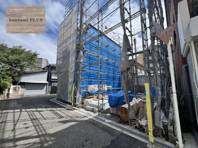 大阪市都島区東野田町4丁目　2号棟の前面道路含む現地写真