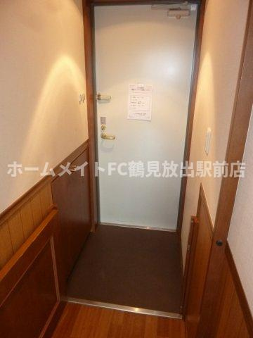 大阪市鶴見区放出東１丁目の賃貸マンションの玄関