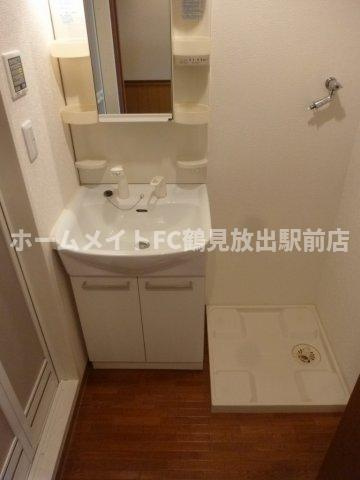 大阪市鶴見区放出東１丁目の賃貸マンションの洗面所
