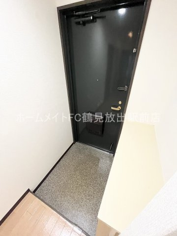 大阪市城東区諏訪１丁目の賃貸マンションの玄関
