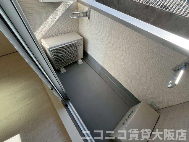 大阪市大正区三軒家西２丁目のアパートのバルコニー