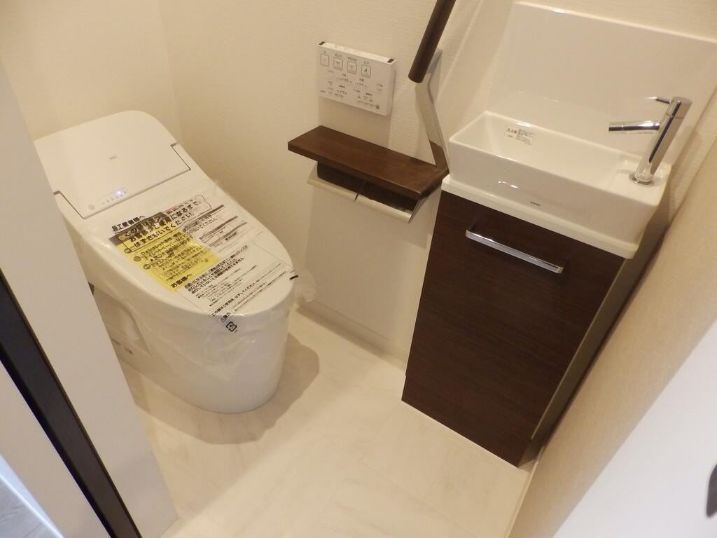 神戸市中央区旗塚通４丁目の賃貸マンションのトイレ
