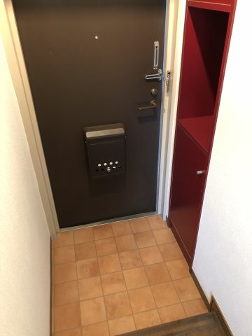川崎市多摩区宿河原６丁目の賃貸マンションの玄関