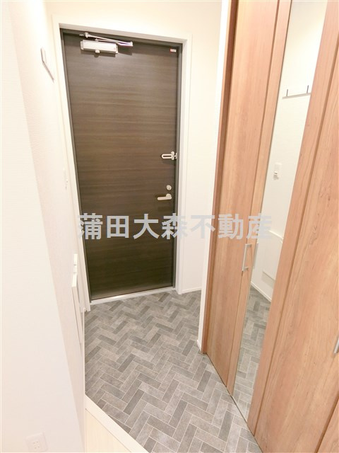 メルヴェーユ久が原の玄関