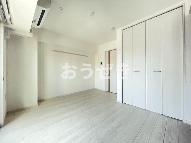 エクセレントアフィー横浜橋の洋室