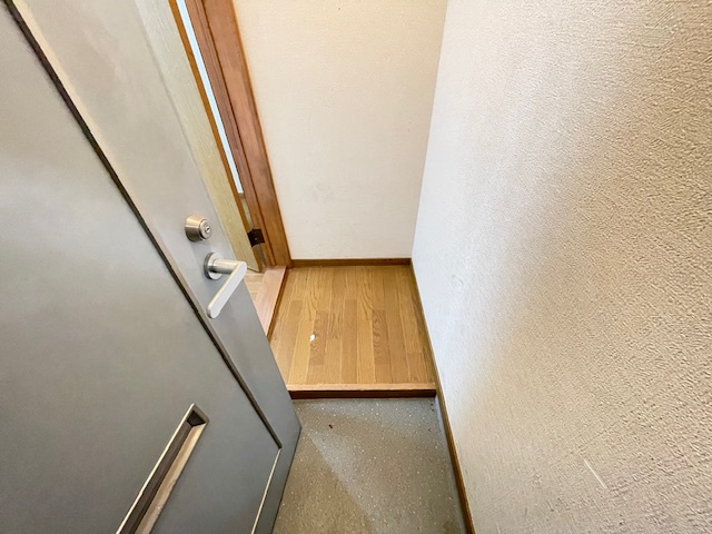 カレッジハウスニシガミⅢの玄関