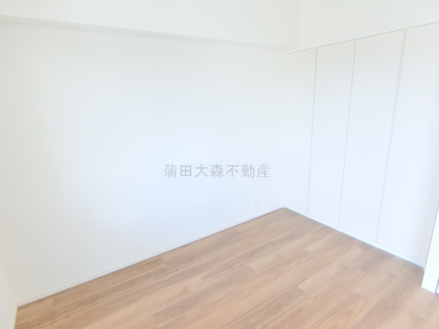 コンフォリア・リヴ大森西の寝室