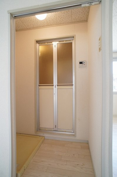 プレジール長妻の玄関