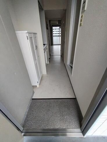 メゾン朋泉高砂の玄関