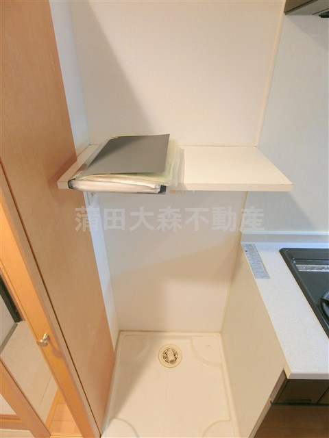 SIN-Cityシンシティー多摩川の設備|棚付きの洗濯機置き場